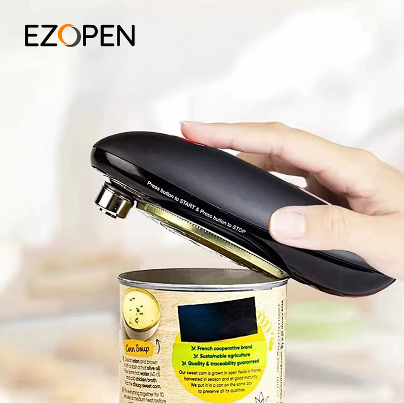 Automatic electric can opener lifting the can lid with its magnet